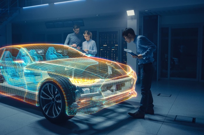 car designers looking at futuristic car